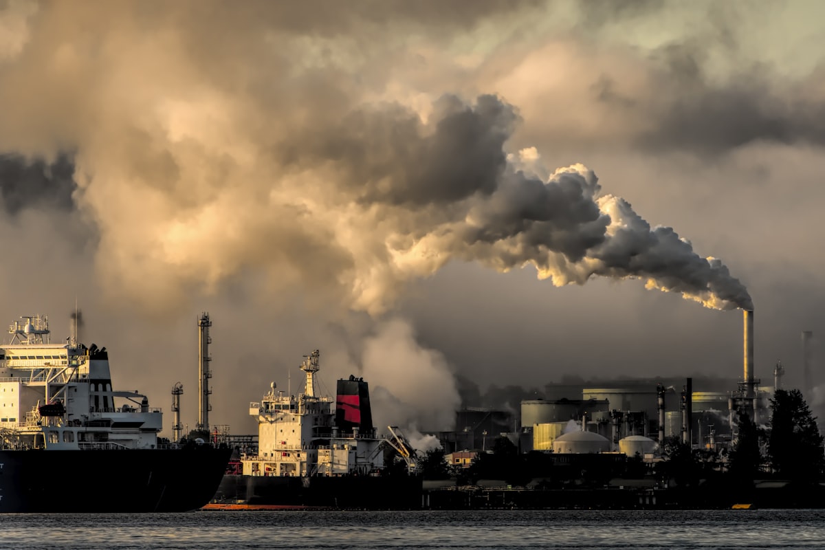 Industrial facility with emissions — CBAM compliance requires accurate carbon accounting for exported goods